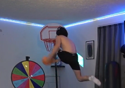 fwhaydo throwing down a massive dunk in his neon-lit room